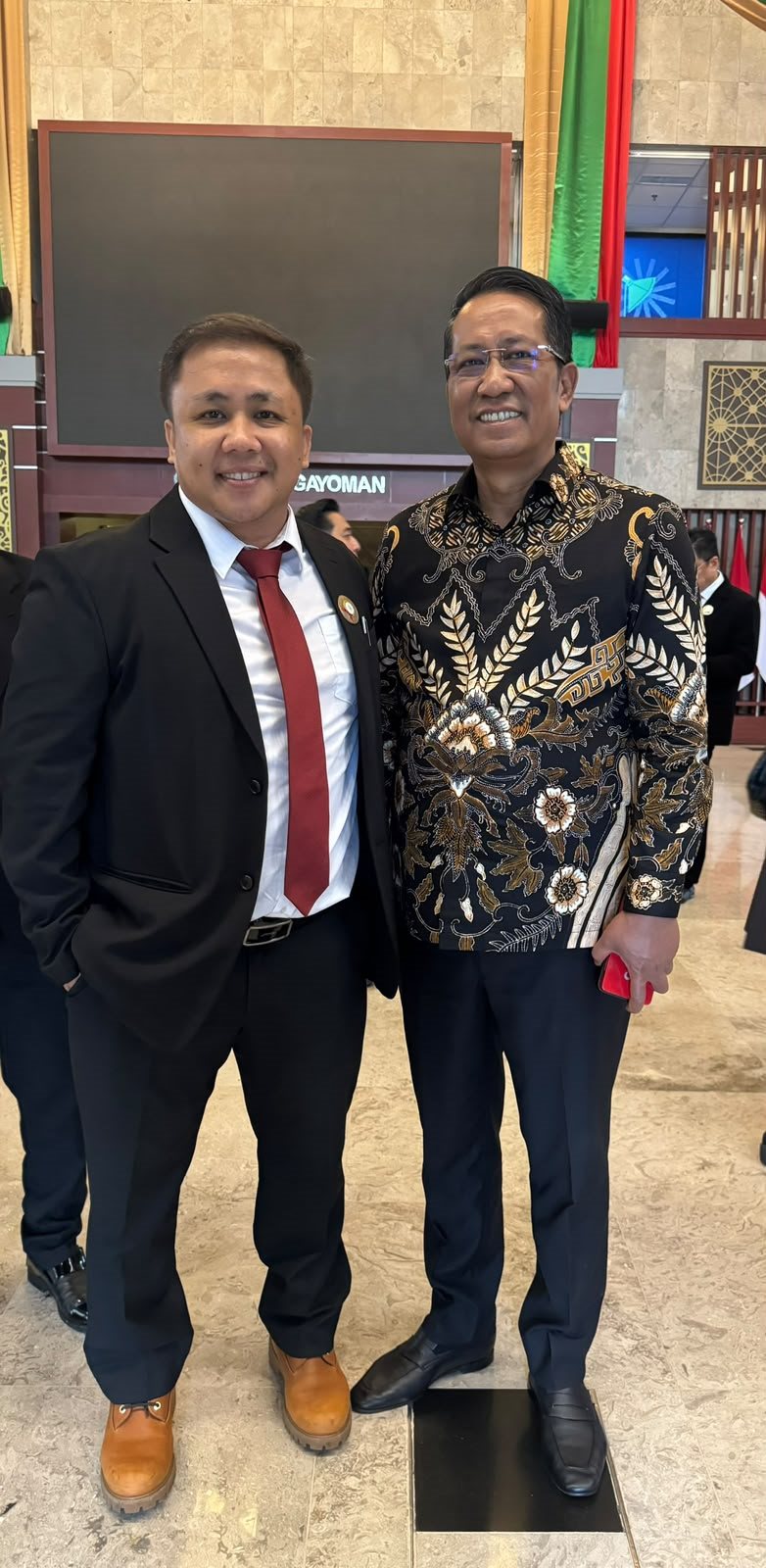 Try Januar Putra with the Minister of Law of the Republic of Indonesia